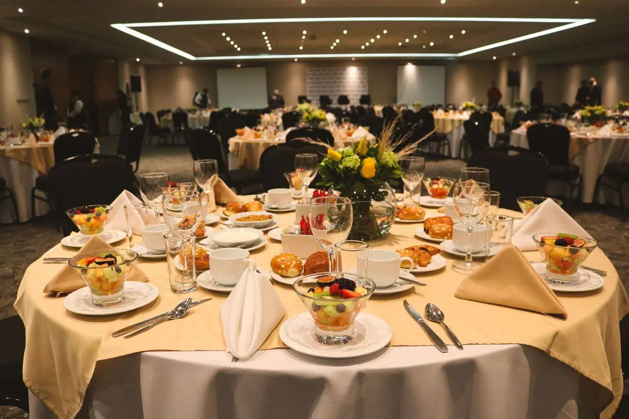Banquet table with dishes and floral centrepiece